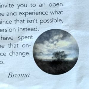 A portion of a letter is seen with some of the typedd text and a small circular photo of a tree infront of a cloudy sky. The name of the writer, "Brenna" is seen next to the photo.