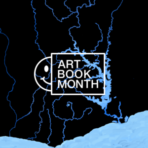 Art Book Month logo, which includes a happy face peaking from behind a white block containing the name, sits over top a stylized map of Ghana's waterways. The country appears in black and the waterways are shown in pale blue.