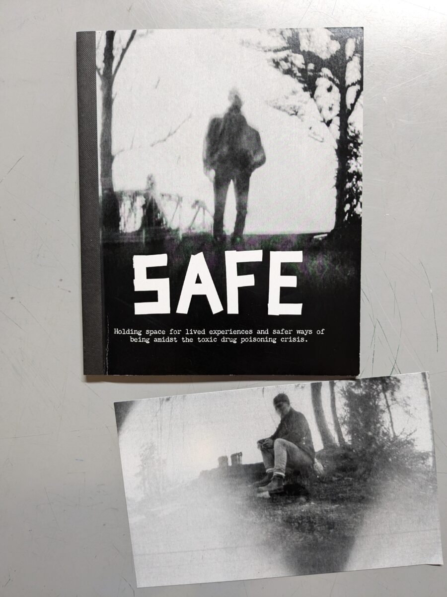 SAFE zine cover and postcard. Both feature black and white photos produced by a pin hole camera. The cover has a fuzzy silhouette of a single human figure framed by trees.